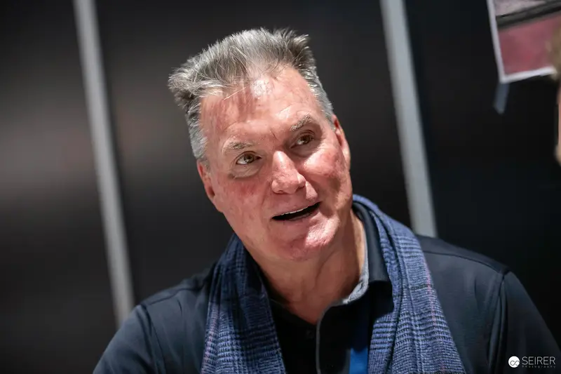 Mature Man in Blue Scarf at VIECC 2023 Photographic Portrait Session