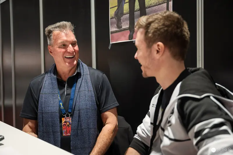 Vienna ComicCon 2023: Candid Interaction Between Two Smiling Participants