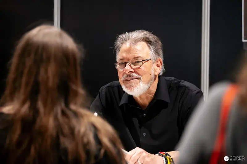 Veteran Comic Artist in Black at Vienna ComicCon 2023 Signing Event