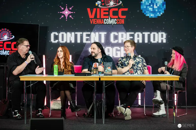 Five-person panel discussion on the Content Creator Stage at VIECC Vienna Comic Con 2023