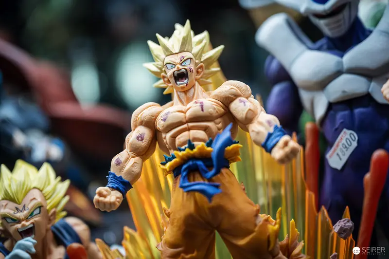 Super Saiyan Goku Dragon Ball figurine on merchandise stand at VIECC Vienna Comic Con 2023