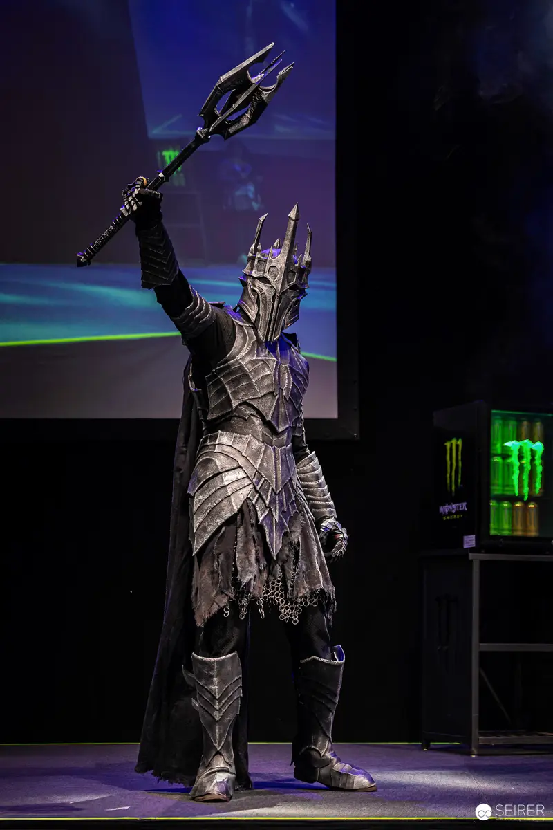 Sauron Cosplayer Raises Mace on Cosplay Stage at VIECC Vienna Comic Con 2023