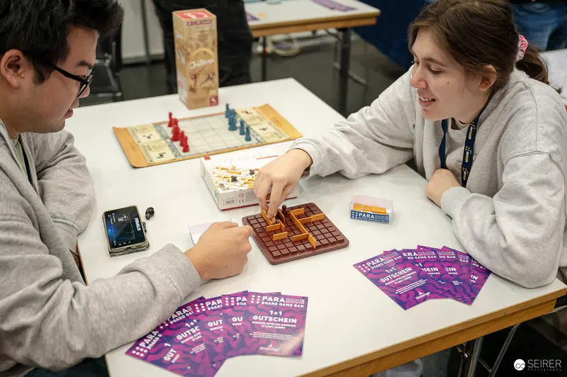 Board game demonstration at Paradice Board Game Bar stand, Vienna Comic Con 2023