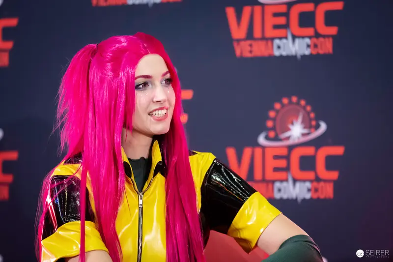 Cosplayer in Pink Wig and Yellow Latex Jacket at VIECC Vienna Comic Con 2023
