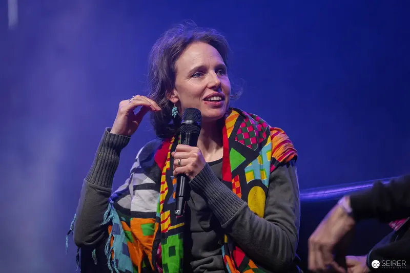 Panel Speaker with Handheld Microphone on Stage at VIECC Vienna Comic Con 2023