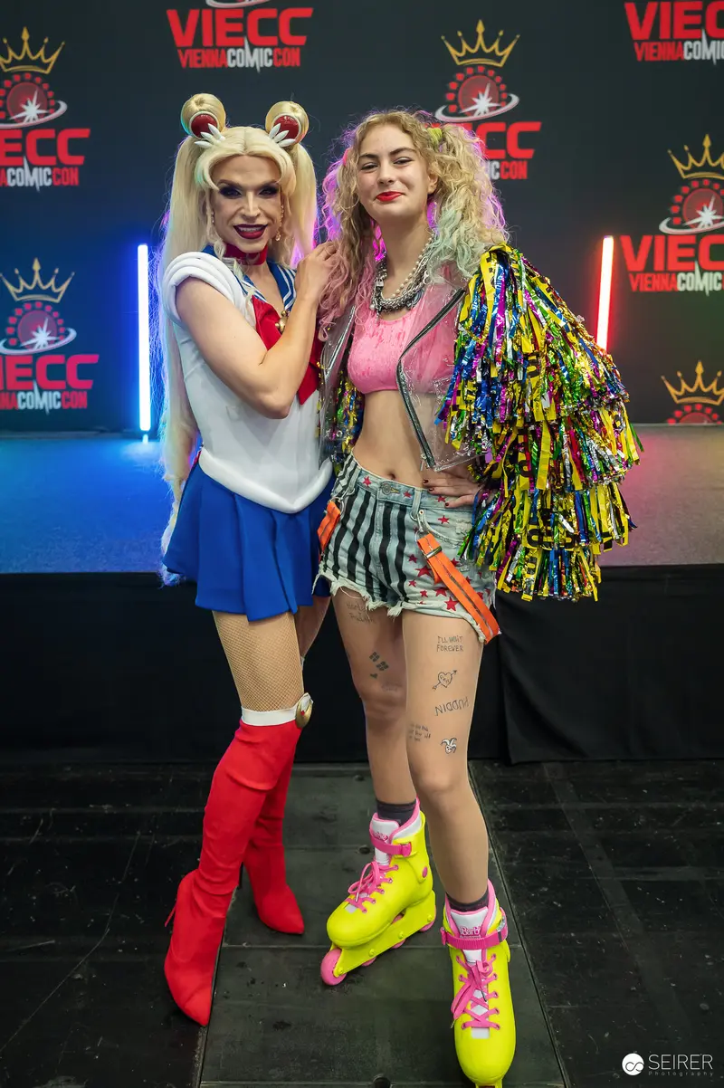 Sailor Moon and Harley Quinn Cosplayers on VIECC Vienna Comic Con Stage, November 2023