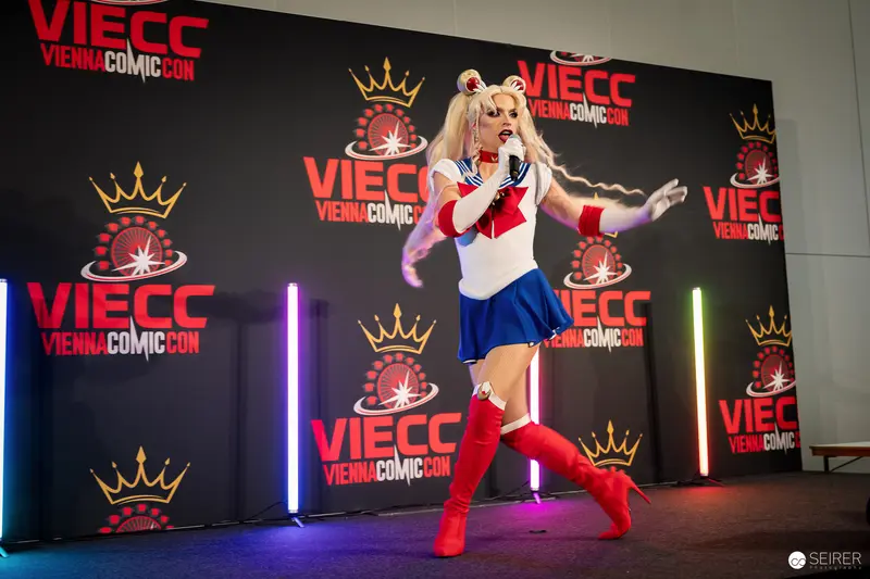 Sailor Moon cosplayer performing on stage at VIECC Vienna Comic Con 2023
