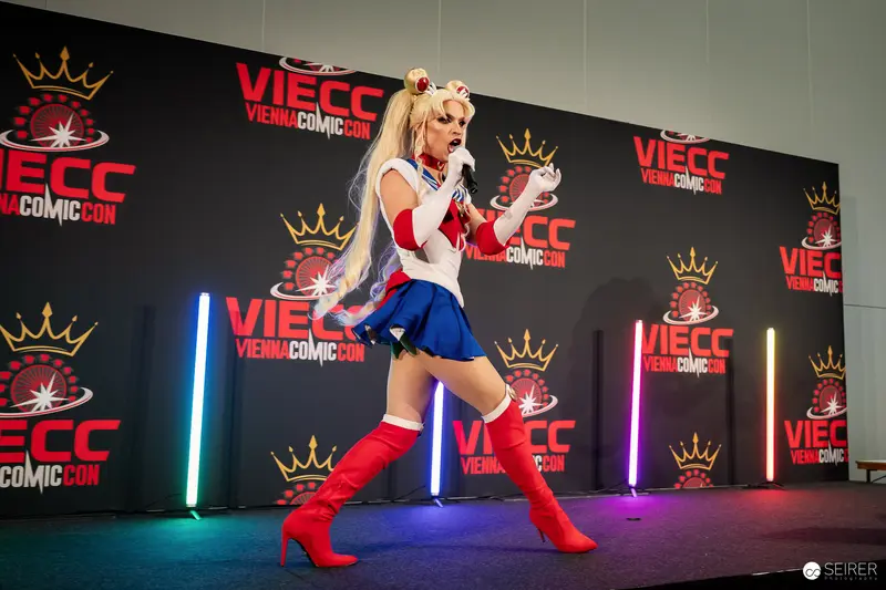 Sailor Moon Cosplayer Performs with Microphone on VIECC Vienna Comic Con Stage