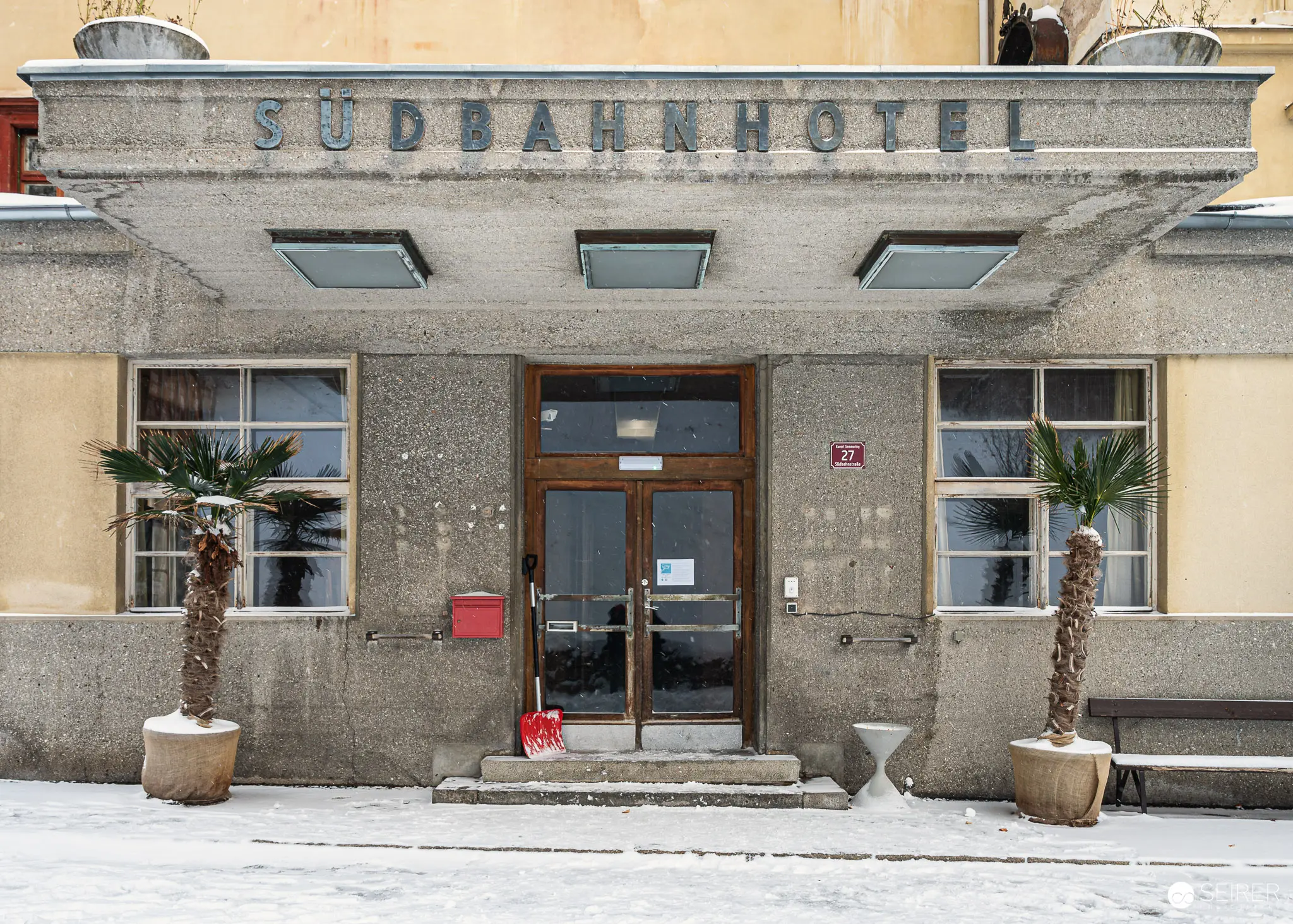 Snow-covered main entrance of the Südbahnhotel, Semmering, November 2023