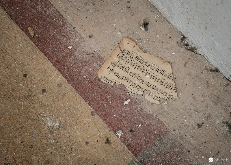 Torn Sheet Music Fragment on Floor of Südbahnhotel Semmering, November 2023