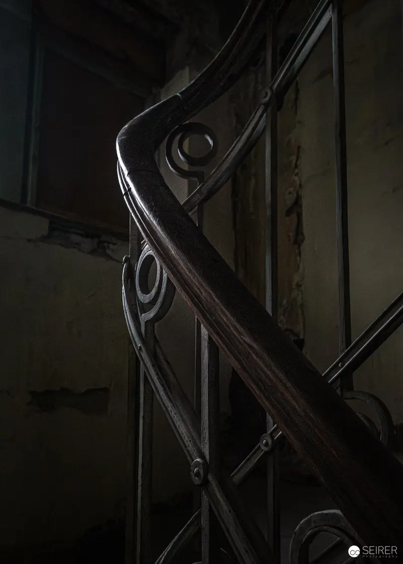 Wrought-iron staircase balustrade with spiral scrollwork, Südbahnhotel Semmering, November 2023