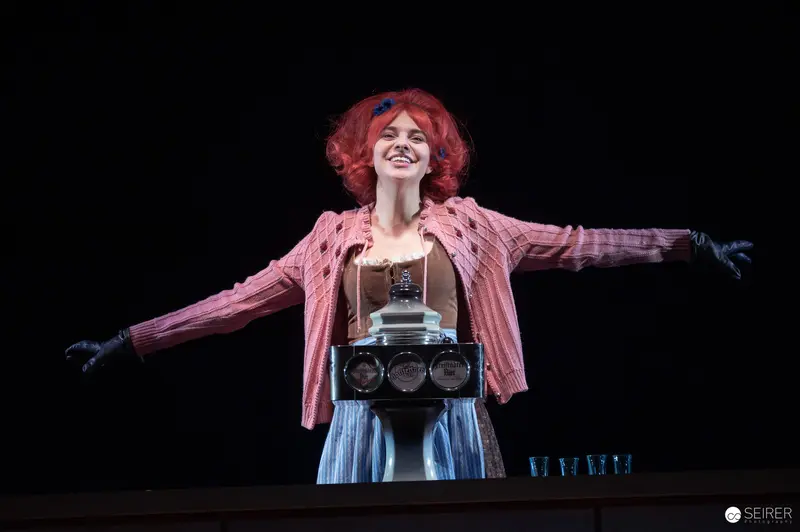 Martina Stilp as Grappina Performing with Boombox in Theater Production
