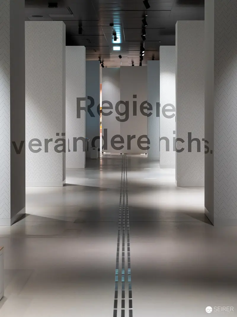 Wien Museum Renovation Interior with Text "Regiele verandere nicht"
