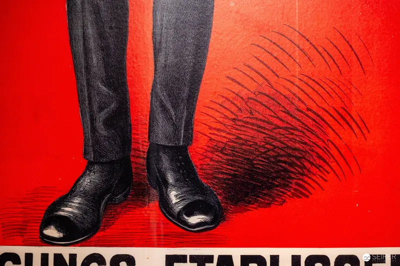 Graphic Design Poster Showcasing Black Shoes on Vibrant Red Background