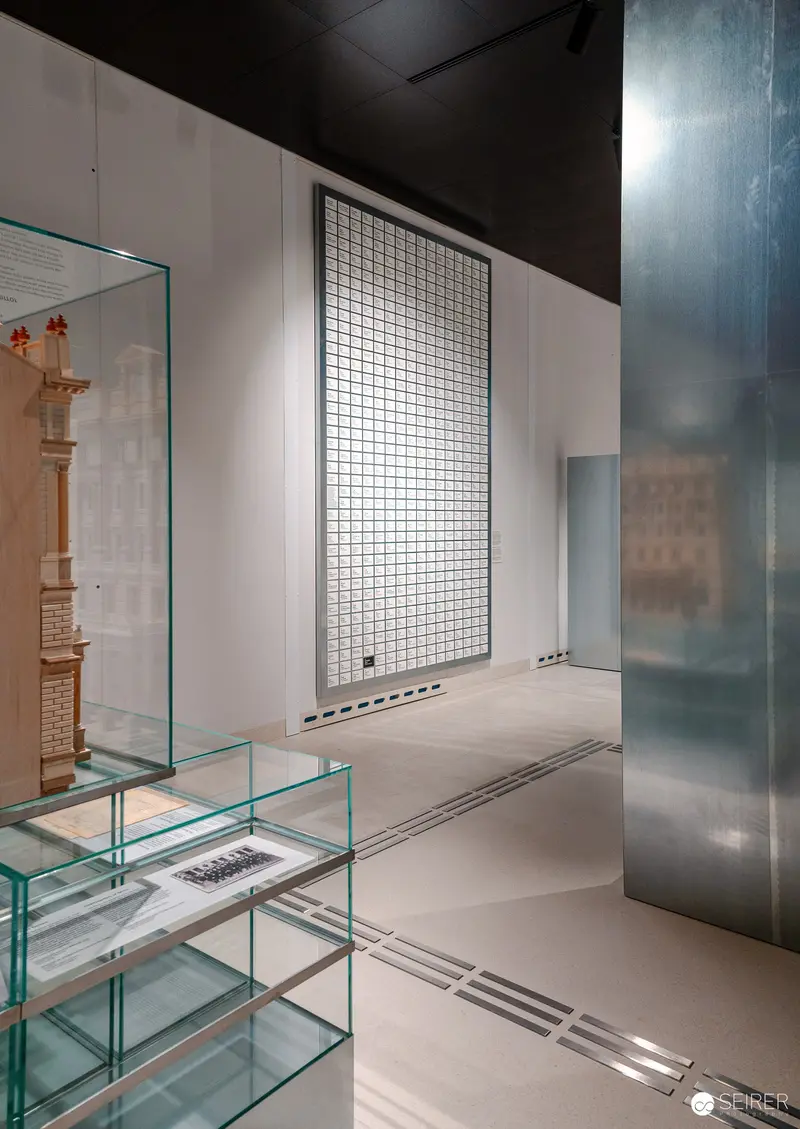 Wien Museum Exhibition Design: Minimalist Glass and Grid Interior Architecture