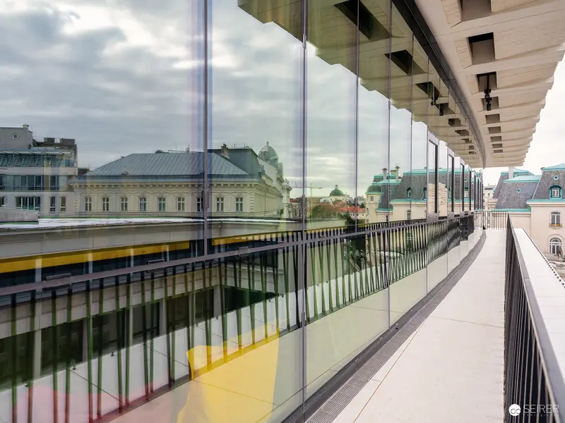 Wien Museum Architectural Glass Gallery with City Reflections and Urban Landscape