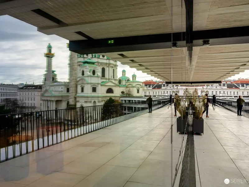 Wien Museum Walkway with Historic Baroque Architecture and Modern Exhibition Space
