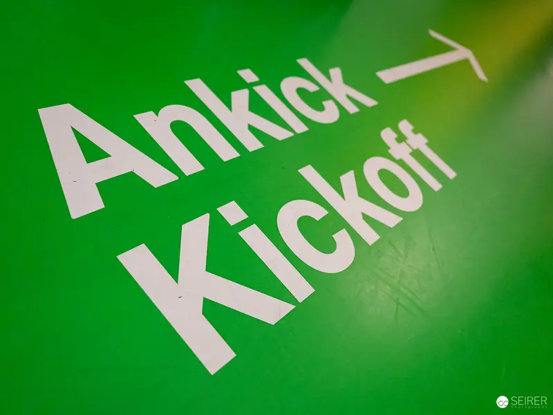 Ankick Kickoff: Green Graphic Design with Typography and Directional Arrow
