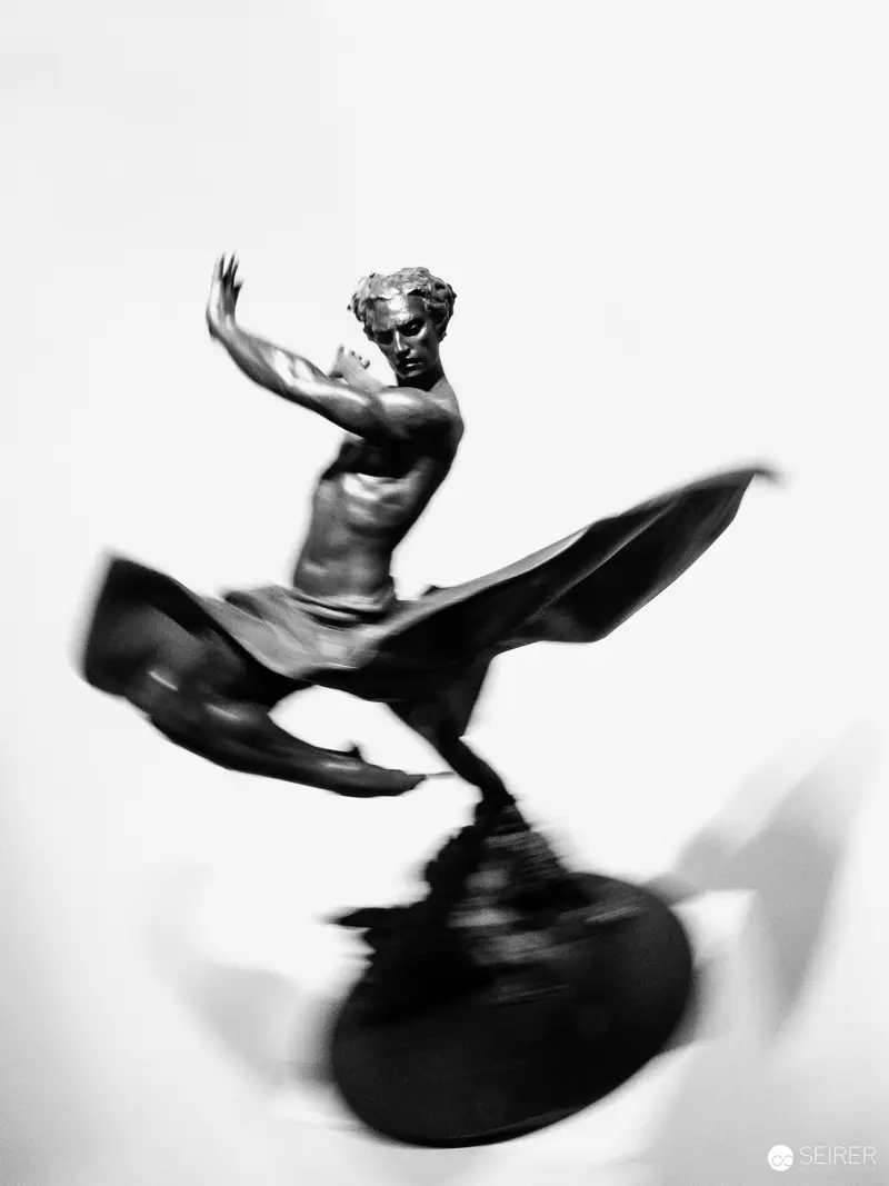 Dynamic Sculptural Figure in Dramatic Black and White Motion Study