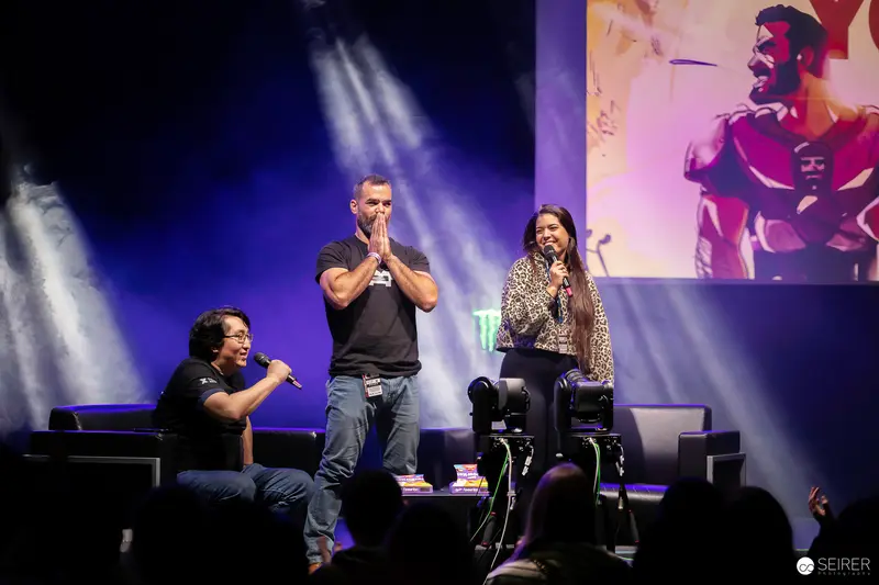 Vienna ComicCon 2023 Panel Discussion with Three Speakers on Stage