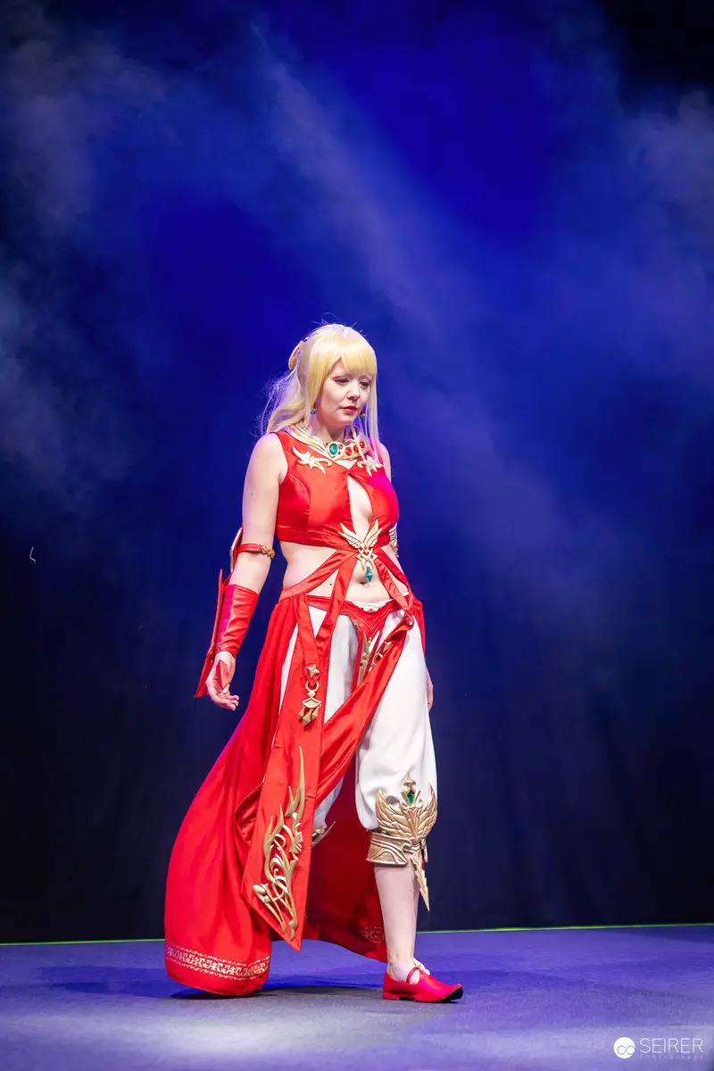 Cosplay Performance at Vienna ComicCon 2023 in Vibrant Red Costume