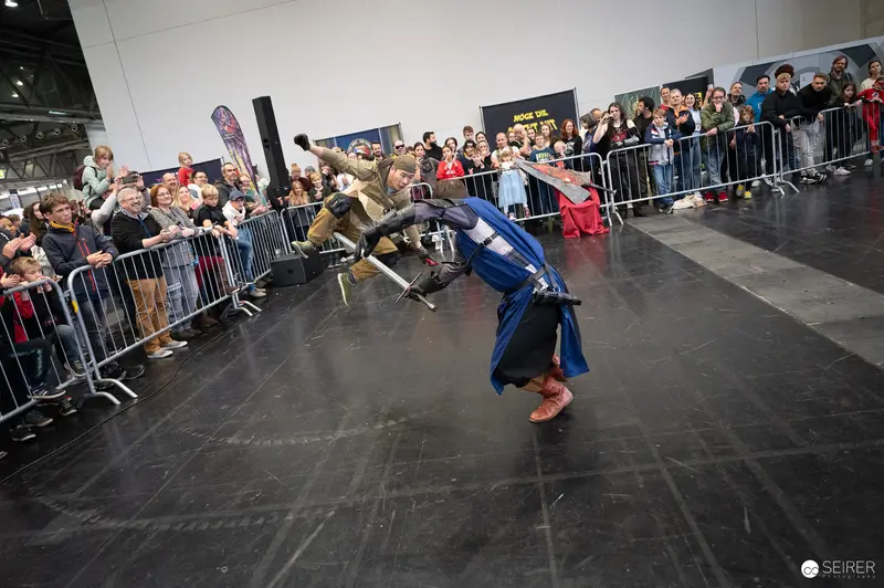 Breakdancer Performing Dynamic Move at Vienna ComicCon 2023