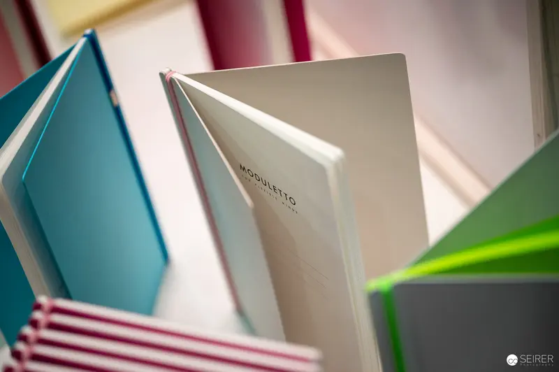 Colorful Books with "Moduletto" Title on Hardcover Spine