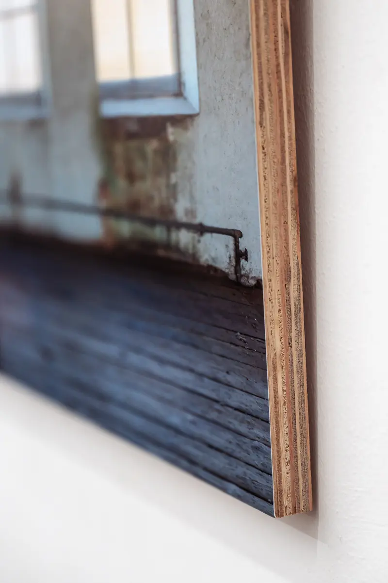 Close-Up of Weathered Wooden Wall with Textured Surface and Window Frame