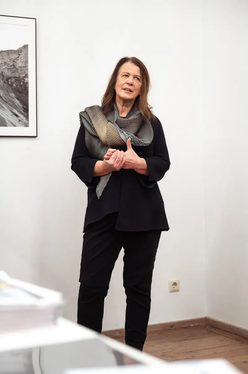 Artist at Prague Photo School Diploma Exhibition Discusses Work in Gallery Setting