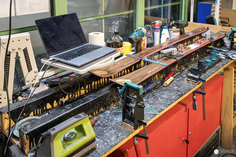 Custom Ski Workshop Setup with Laptop and Tools at Ünique Skis in Vienna
