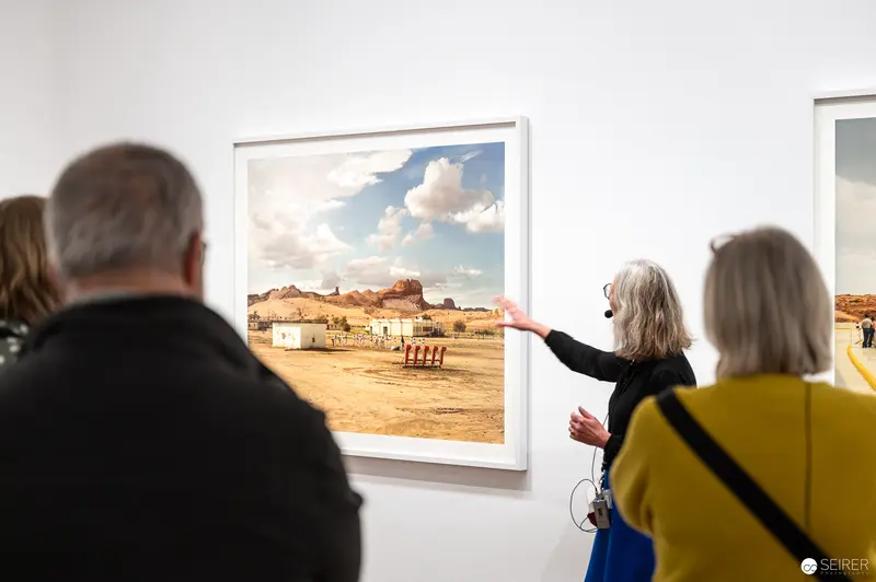 Joel Sternfeld "American Prospects" Exhibition Visitors Examining Landscape Photograph at Albertina