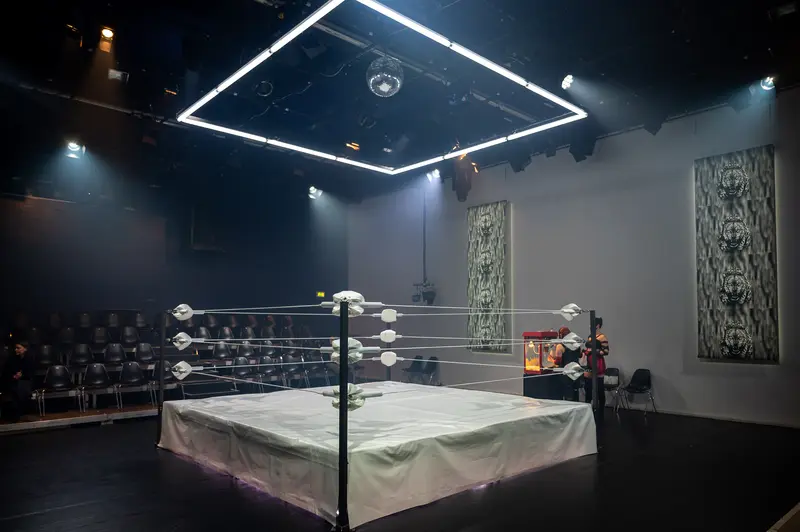 Empty Wrestling Ring with Dramatic Lighting at Kosmos Theater, Wien
