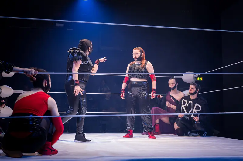 Wrestlers Confronting in Ring During Kosmos Theater Performance in Wien