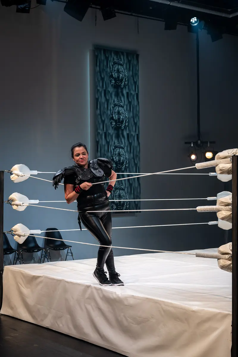Actor Bound by Ropes in Experimental Theater Performance at Kosmos Theater