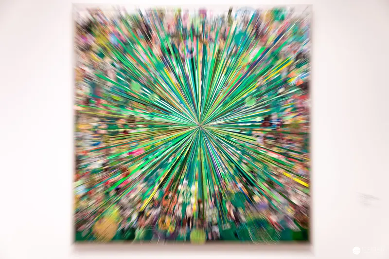 Radiant Abstract Artwork with Explosive Green Starburst Pattern