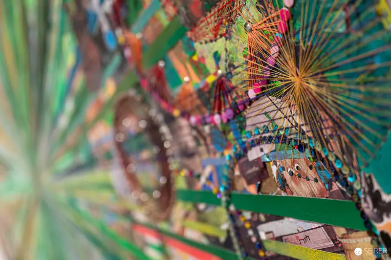 Colorful Radial Art Installation with Intricate String Patterns at Albertina Modern