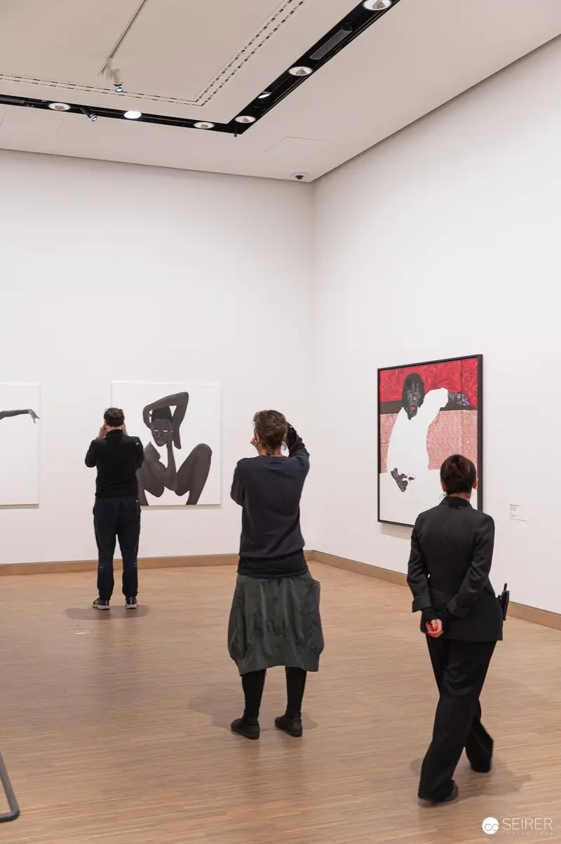 Visitors Observing Artworks at Albertina Modern's "The Beauty of Diversity" Exhibition