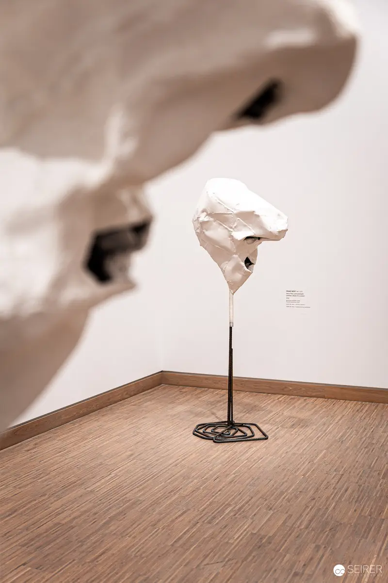Delicate Sculptural Form on Minimalist Wooden Display at Albertina Modern