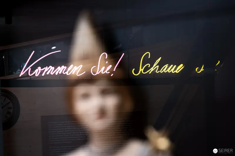 Neon Text on Window at Prater Museum Opening in Vienna, March 2024