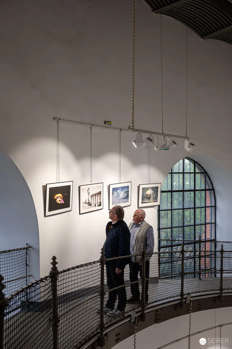 Two Visitors at "Water Source of Life" Exhibition in Favoriten Water Tower