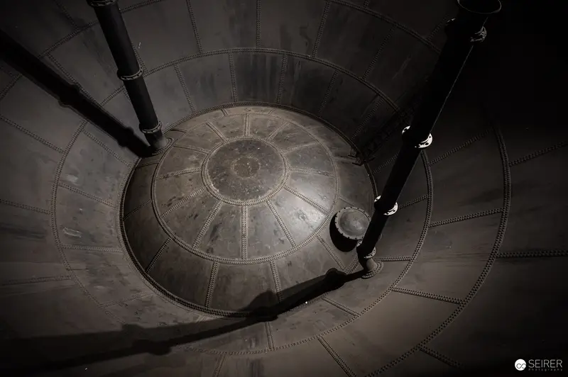 Water Tower Interior: Spiral Concrete Architectural Structure with Curved Walkway