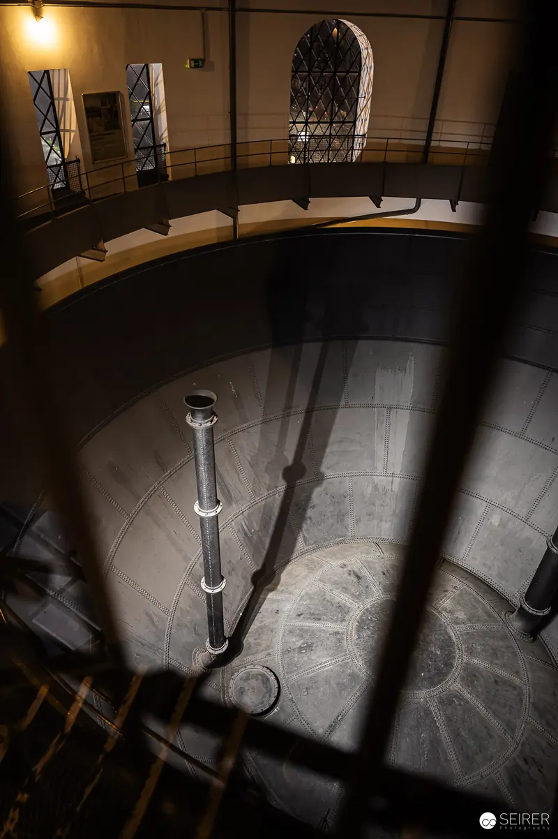 Water Tower Interior with Architectural Lighting and Curved Walls in Vienna