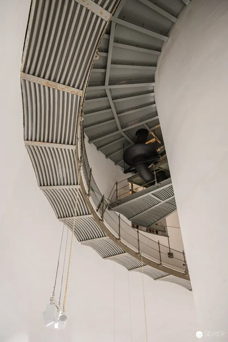 Interior View of Curved Metal Staircase in Wasserturm Favoriten Exhibition Space