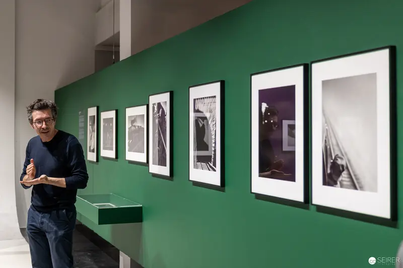 René Groebli Exhibition Opening at Westlicht Gallery, Photographer Beside Black and White Prints