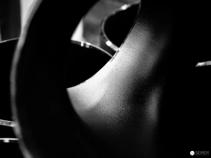 Abstract Black and White Curved Surface with Textural Highlights