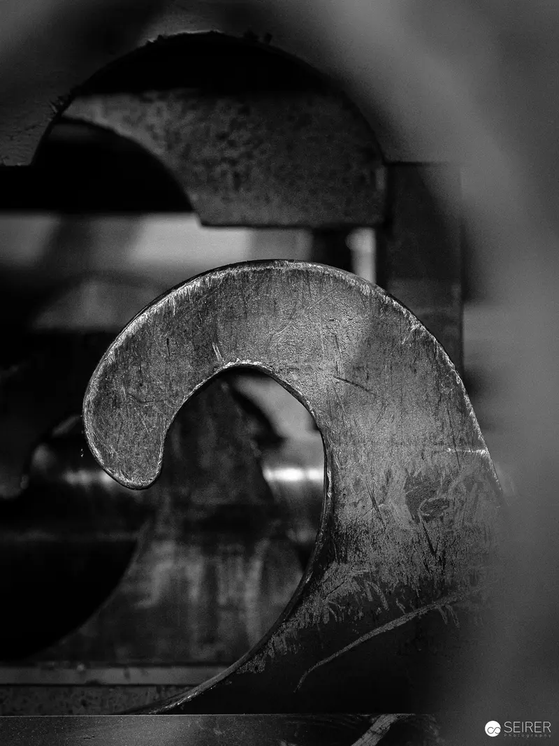 Metallic Industrial Component in Monochrome Close-Up Machinery Detail