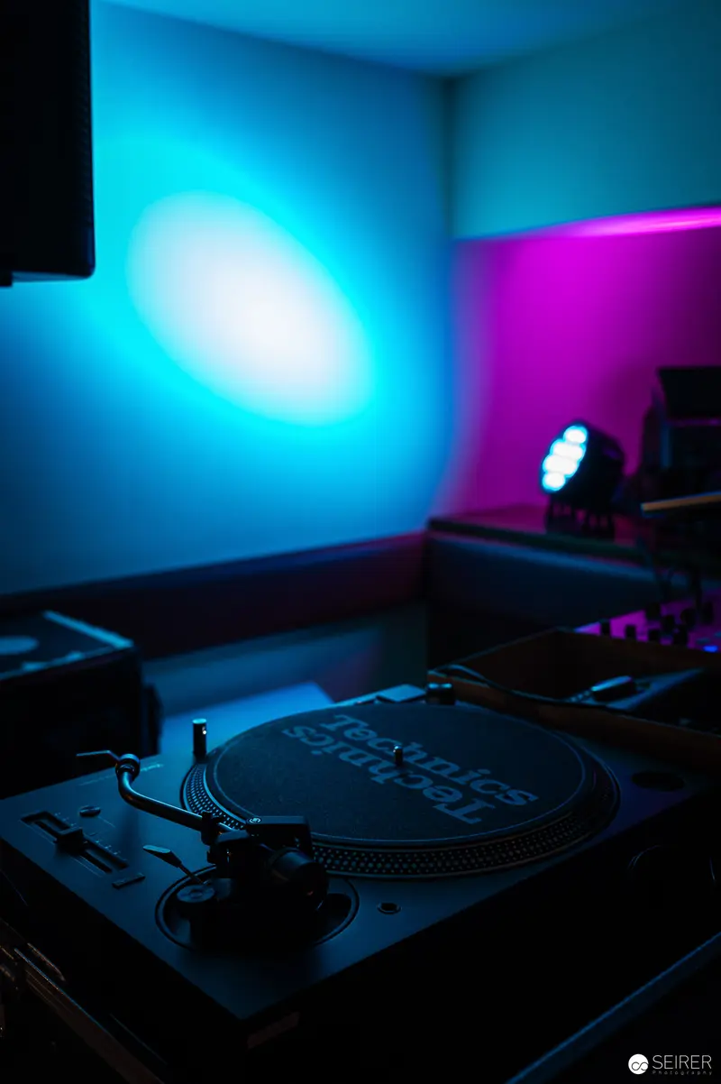 Turntable Studio with Vibrant Blue and Magenta Lighting