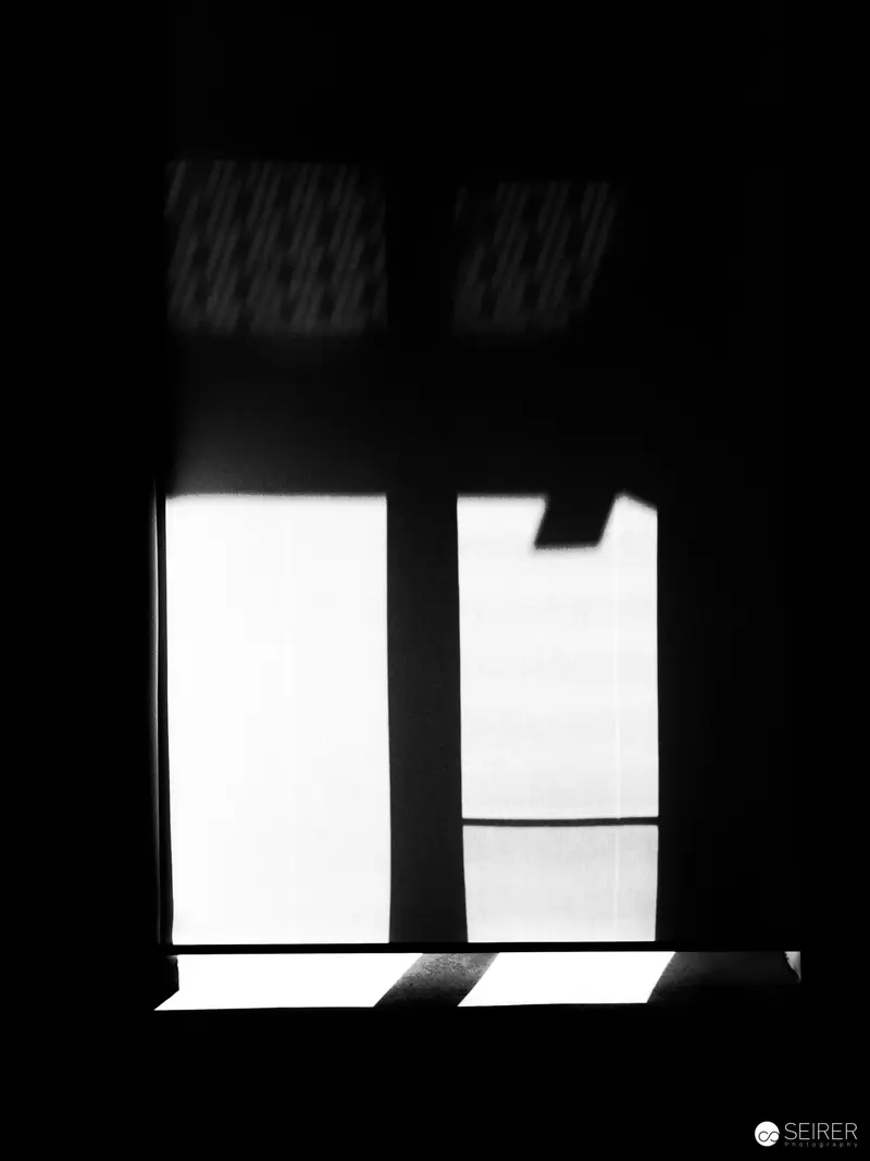 Black and White Abstract Window Silhouette with Stark Geometric Contrast