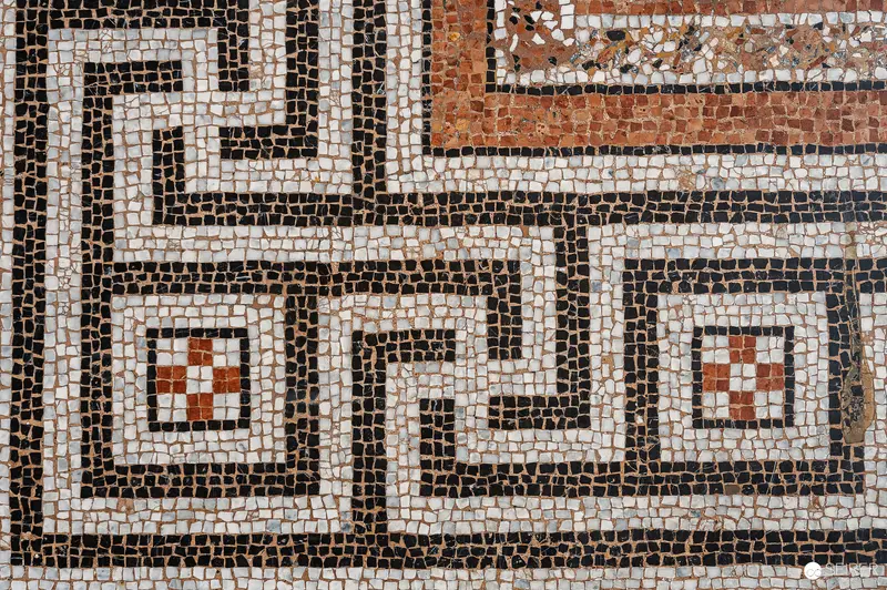 Ancient Roman Geometric Mosaic with Intricate Black and White Pattern
