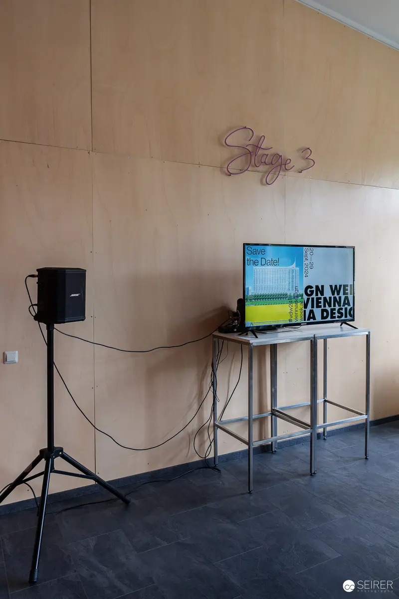 Audiovisual Equipment Setup in Gallery Space with Monitor Display